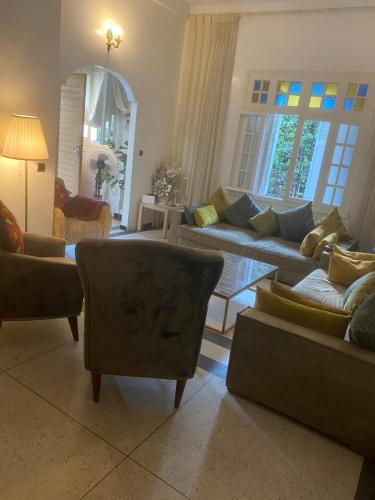 a living room with couches and chairs in it at Lux Villa in Casablanca