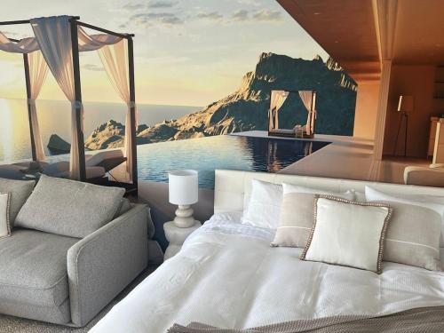a bedroom with a bed and a view of the ocean at Bay View Motel - Sunrise in Lorne