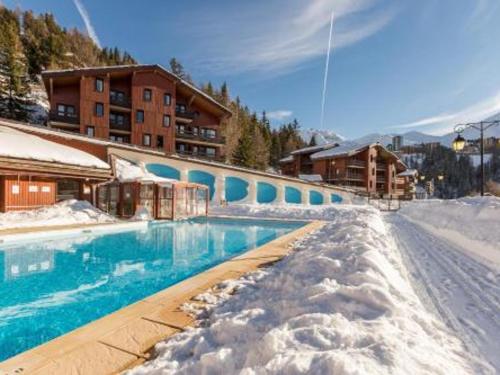 Appartement cosy avec balcon, piscine et parking en option à Plagne 1800