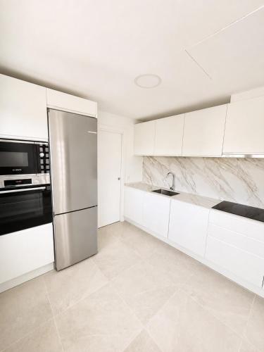 New modern in La Cala with terrace and pool