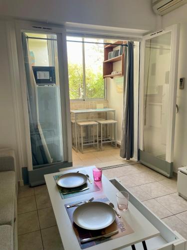 Studio climatisé en bord de mer et Plage privée