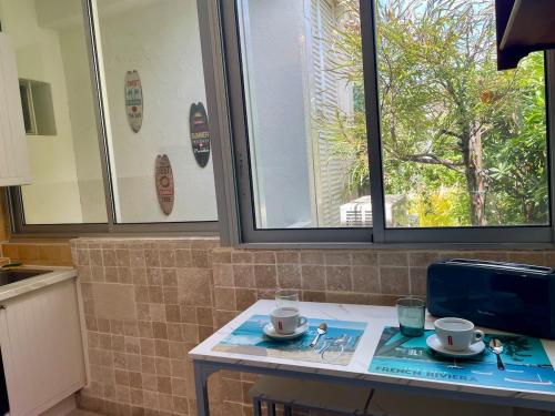 Studio climatisé en bord de mer et Plage privée