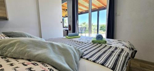 Beach houses Ive & Beta, olive grove, sea, swimming pool, jacuzzi, fenced yard, barbecue - Istria