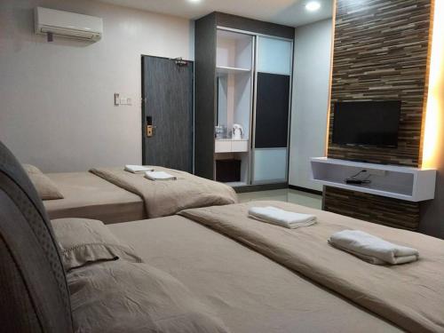 Кровать или кровати в номере Lim Mini Hotel