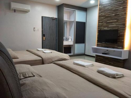 TV a/nebo společenská místnost v ubytování Lim Mini Hotel