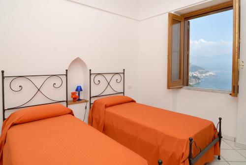 Katil atau katil-katil dalam bilik di Casa Marechiaro