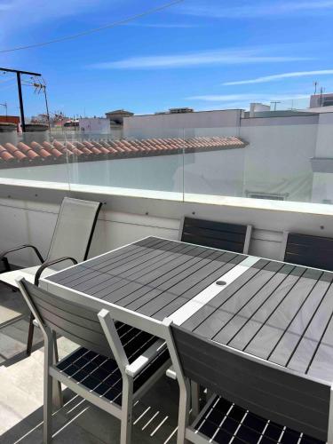 A duplex penthouse with a terrace and a parking space