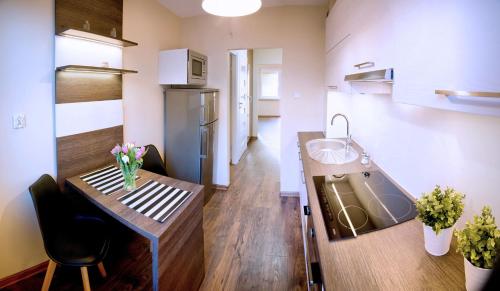 Кухня или мини-кухня в Apartament Fryderyk Premium 2
