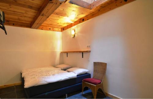 Tempat tidur dalam kamar di Herkenhoek 5 bedroom apartment