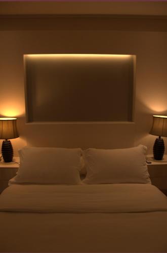 Katil atau katil-katil dalam bilik di Hotel Puerto de Vega