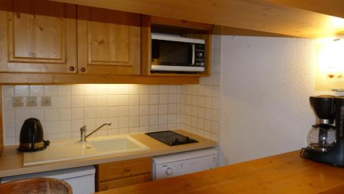 Résidence Aiguille Grive Bat Iii - Appartement 2 pièces 6 personnes en duplex, skis aux pieds, dans le village de Charmettoger à Arc 1800 MAE-1696
