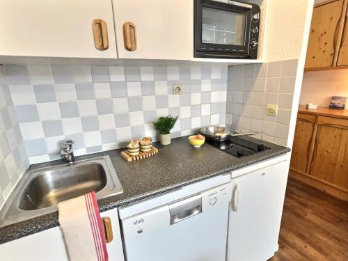 Résidence Le Chantelouve - Studio cabine avec mezzanine pour 5 personnes à Val d'Isère à 300m du centre du village et 450m des pistes MAE-1805
