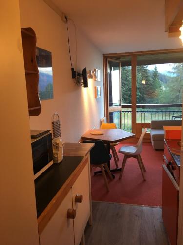 Résidence Grand Arbois - Studio 4 personnes au cœur de la station d'Arc 1800 dans le village des Villards, proche des pistes et des commerces MAE-1954