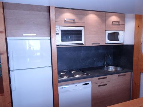 Résidence Tournavelles - Appartement 4 pièces 8 personnes avec vue sur les pistes, skis aux pieds et proche des commerces dans le village des Villards à MAE-2008