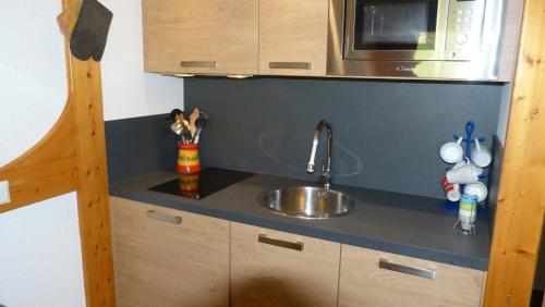 Résidence Tournavelles - Appartement 2 pièces 5 personnes avec vue sur les pistes, skis aux pieds et des commerces, proche de l'ESF et de la garderie dan MAE-2071
