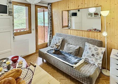 Résidence Divaria - Studio cabine 4 personnes à Tignes au pied des pistes et proche des commerces dans le quartier du Lac. Situé en rez de jardin d' MAE-2114