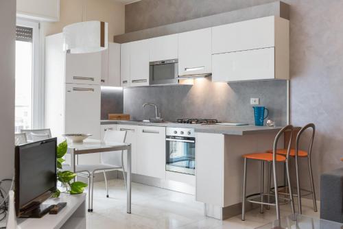 Cuisine ou kitchenette dans l'établissement Dimore Verona
