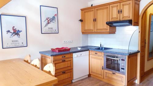 Résidence L'ermitage - Appartement 3 pièces mezzanine pour 6 personnes situé à Méribel centre proche des commerces et des pistes de ski MAE-7944