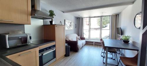 Résidence Aiguille Grive Bat Iii - Appartement 3 pièces 6 personnes en duplex, skis aux pieds, dans le village de Charmettoger à Arc 1800 MAE-6944