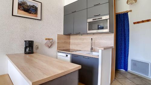 Résidence Caron - Appartement duplex lumineux · Départ et retour skis aux pieds · Balcon MAE-0004
