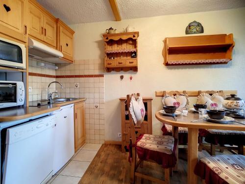 Résidence Boedette A - Appartement confortable · Départ et retour skis aux pieds · Balcon MAE-1004