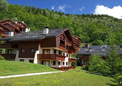 Résidence Les Fermes de Méribel - maeva Home - Appartement 10 personnes 3 chambres + 1 chambre mezzanine MAE-1374