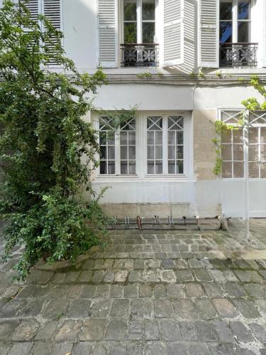 Romantique petit duplex au cœur du Marais