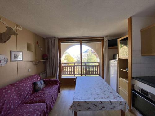 Résidence Soleil - Appartement T2 skis aux pieds avec vue sur les montagnes et place de parking privée couverte MAE-5401