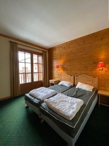 Résidence Alpina Lodge - Séduisant et chaleureux appartement pour 6pers. au pied des pistes MAE-5631