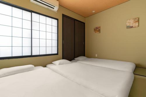 鶴Inn 岸里駅徒歩3分 天下茶屋駅徒歩7分 心斎橋 関西空港直通 贅沢な和モダン一軒家 潮風荘
