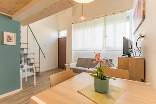 Loft with mezzanine in Baggio by Thinah