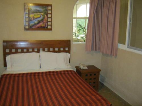 Katil atau katil-katil dalam bilik di Hotel Real Santa María