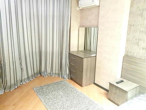 En eller flere senger på et rom på Apartment on MirQasimov st.29