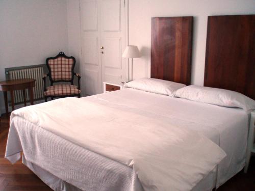 Cama o camas de una habitación en Hotel Tunquelén