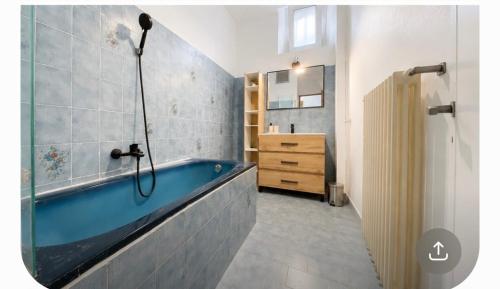 Appartement 2 chambres avec une grande terrasse dans un endroit calme et familial
