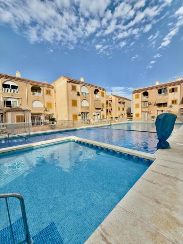 Sunny Apartament with Pool & Beach