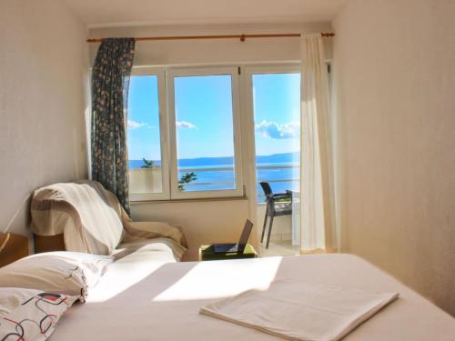 Villa Maslina-Olive two bedroom apartment with balcony and sea view Igraine