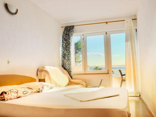 Villa Maslina-Olive two bedroom apartment with balcony and sea view Igraine