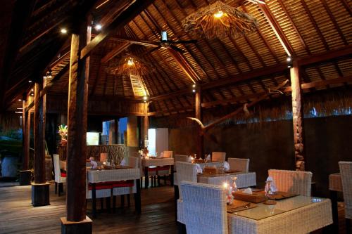 Un restaurante u otro lugar para comer en Ubud Virgin Villa