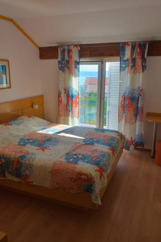 Apartments by the sea Banjol, Rab - 4968