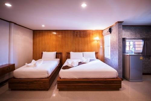 Llit o llits en una habitació de Viking Resorts