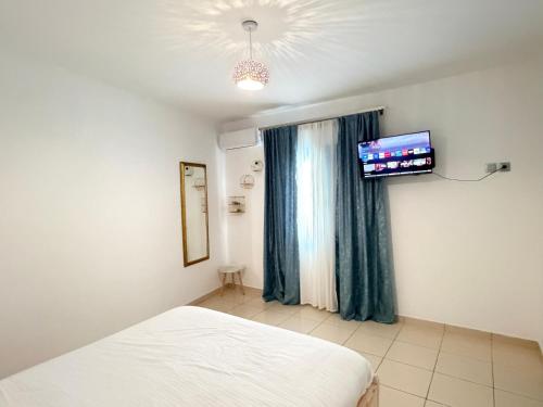 Fira Downtown Apartment