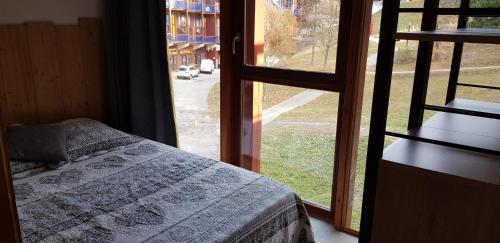 Résidence Aiguille Grive Bat Iii - Appartement 2 pièces 6 personnes en duplex, skis aux pieds, dans le village de Charmettoger à Arc 1800 MAE-1708