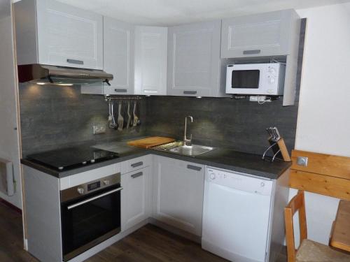 Résidence Aiguille Grive Bat Iii - Appartement 2 pièces 6 personnes en duplex, skis aux pieds, dans le village de Charmettoger à Arc 1800 MAE-1708