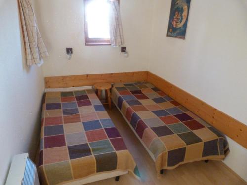 Résidence Armoise - Appartement 2 pièces / 6 personnes à Arc 1800 en centre station, proche des pistes et des commerces, dans le village des Villard MAE-1879