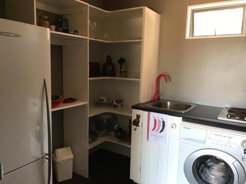 Η κουζίνα ή μικρή κουζίνα στο Miranda Sea View Apartment
