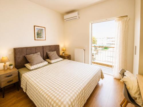 Wonderful Garden #2, 80 sqm with a large terrace, 3 bedrooms, comfortable, quiet, and upscale neighborhood, close to the subway, free parking, 15 minutes direct to Athens Airport