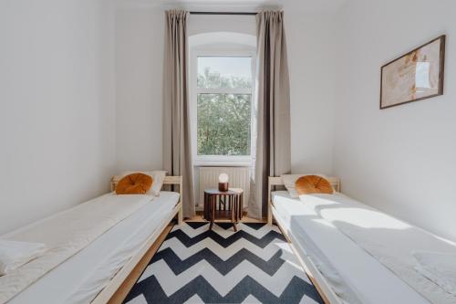 Charmanter Altbau im Herzen von Linz mit Self-Checkin, WLAN und 2 getrennten Schlafzimmern