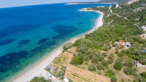an aerial view of a beach and the ocean at House Dorita in Miholašćica
