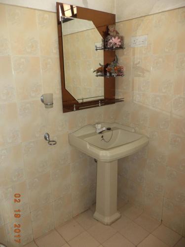 Ванная комната в Raja174 Homestay